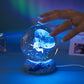 Lámpara nocturna luminosa con bola de cristal y base de resina
