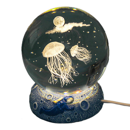 Lámpara nocturna luminosa con bola de cristal y base de resina